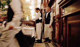 Waiters at Le Balzar brasserie - an institution in the heart of latin quarter district